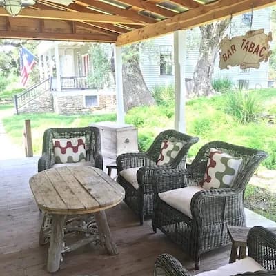 Segar House porch with rocking chairs at Round Top Inn